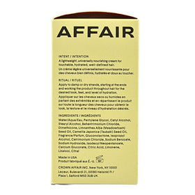 CROWN AFFAIR applied to damp hair demonstrating frizz control and definition