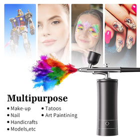 crpen airbrush in hand indicating compact handheld size and ergonomic benefit