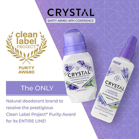Crystal Essence bottle beside phone for scale showing portable travel benefit