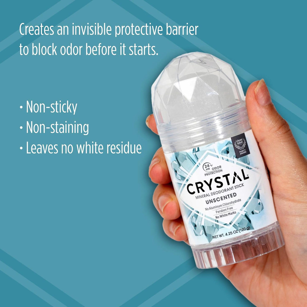 Crystal Essence applying stick to underarm, gentle odor control during daily routine