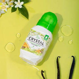 Crystal Essence roll-on applicator in use for easy, precise application