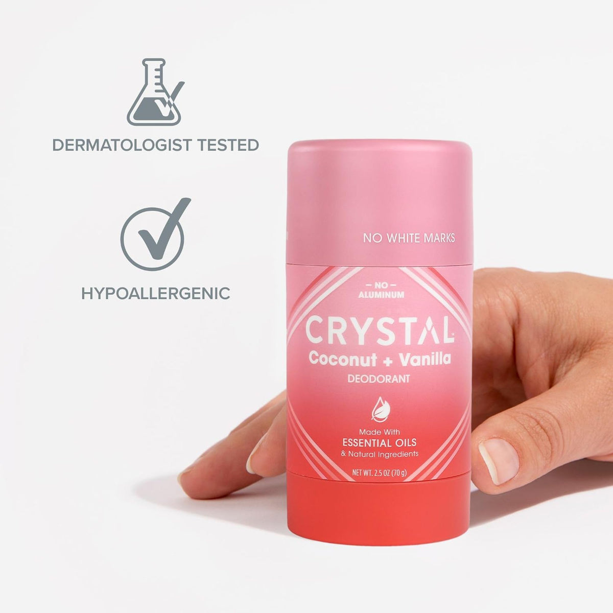 Crystal Essence stick held in hand for size and portability benefit