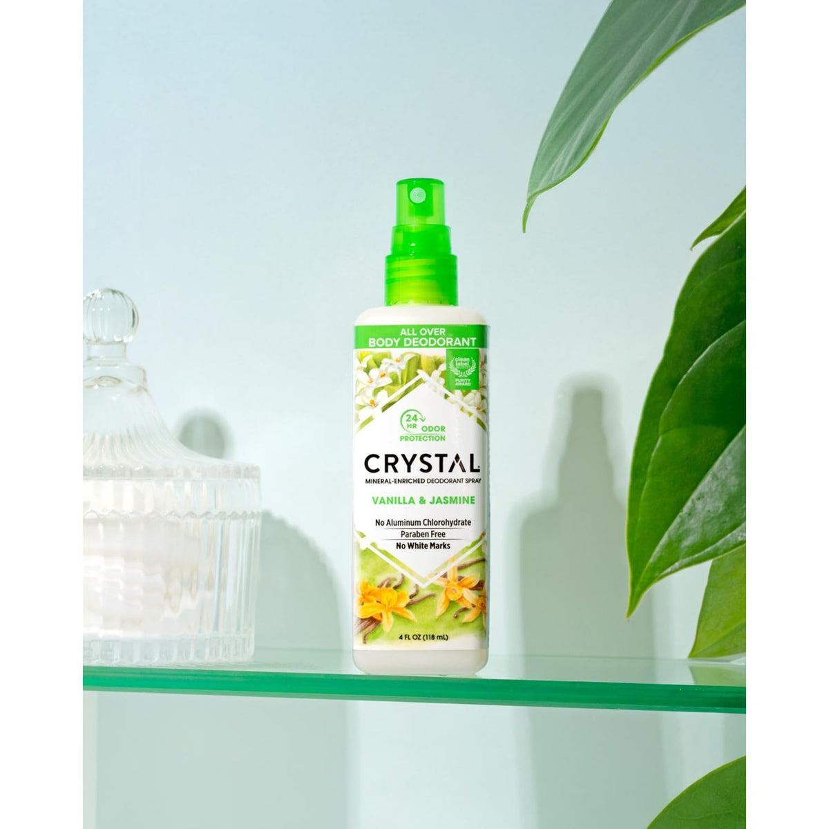 Crystal Essence fine mist on skin showing quick-dry non-sticky finish benefit
