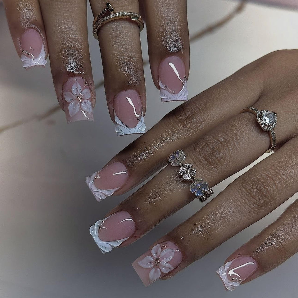 CTTHNBD front packaging showing white French tip floral nails and tools