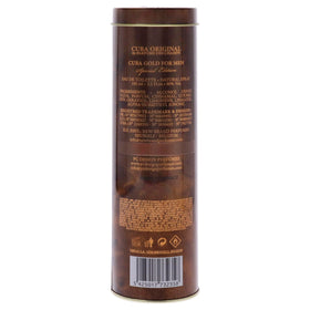 Cuba Gold next to everyday items showing 3.4 ounce scale and travel readiness