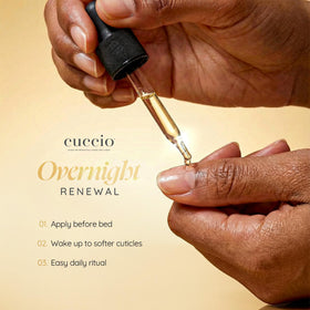 Cuccio bottle in hand to show 2.3 fl oz scale and travel-friendly convenience