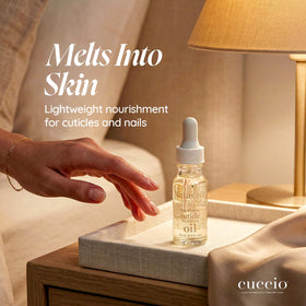 Cuccio close-up of oil texture showing lightweight sheen and quick absorption benefit