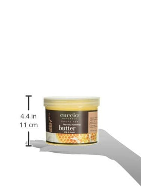 Close-up of Cuccio product label showing milk and honey ingredient callouts