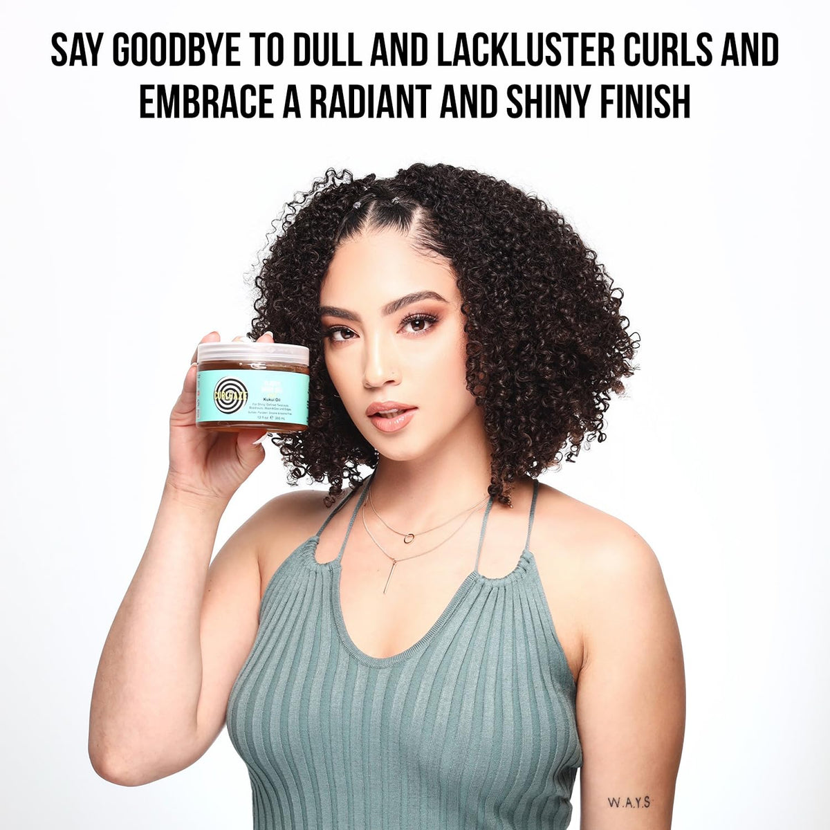 Curldaze kukui oil ingredient close-up emphasizing natural shine and moisture