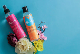 Curls being applied to curly hair to quickly reactivate and define curls