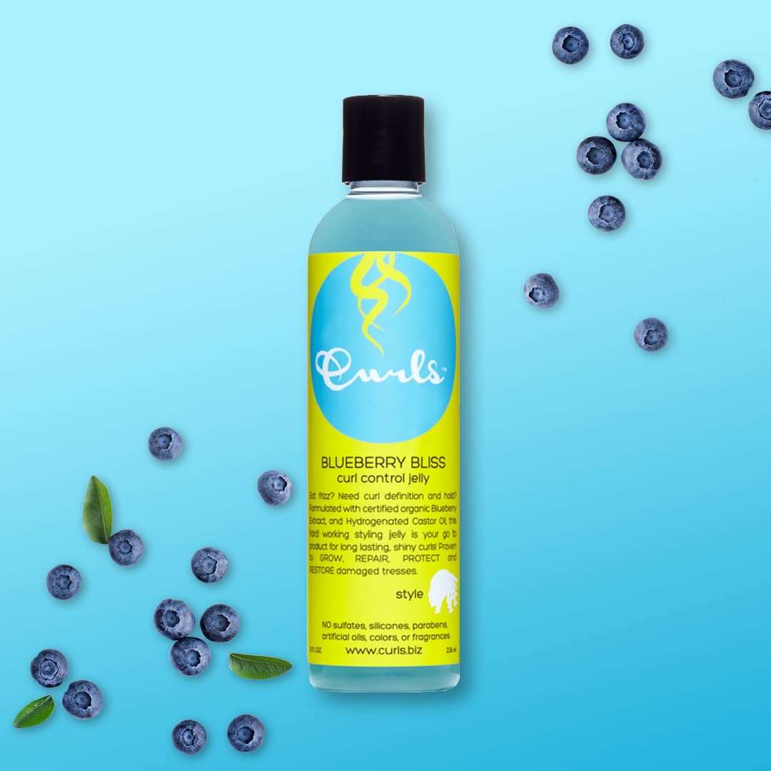 Curls blueberry bliss being applied to wet hair for definition and frizz control