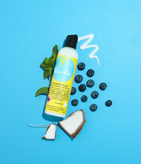 Curls Blueberry Bliss ingredients label highlighting natural extracts