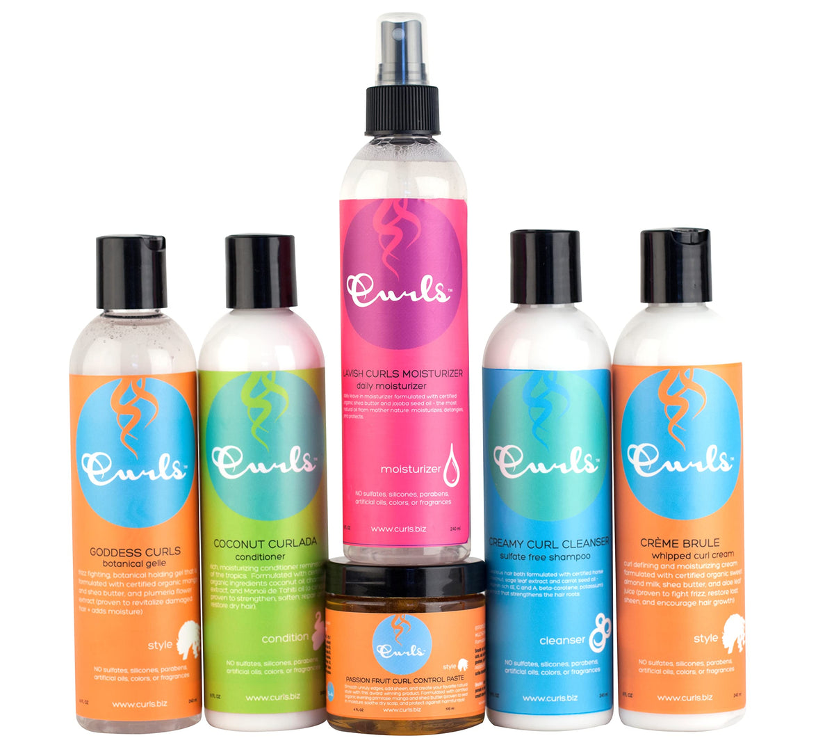 Curls Passion Fruit Control Paste applied to hairline while smoothing edges with a brush for polished, touchable hold
