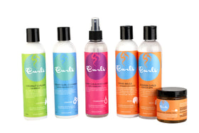 Curls Passion Fruit Control Paste beside a 4 fl oz reference object showing compact size for travel and countertop use