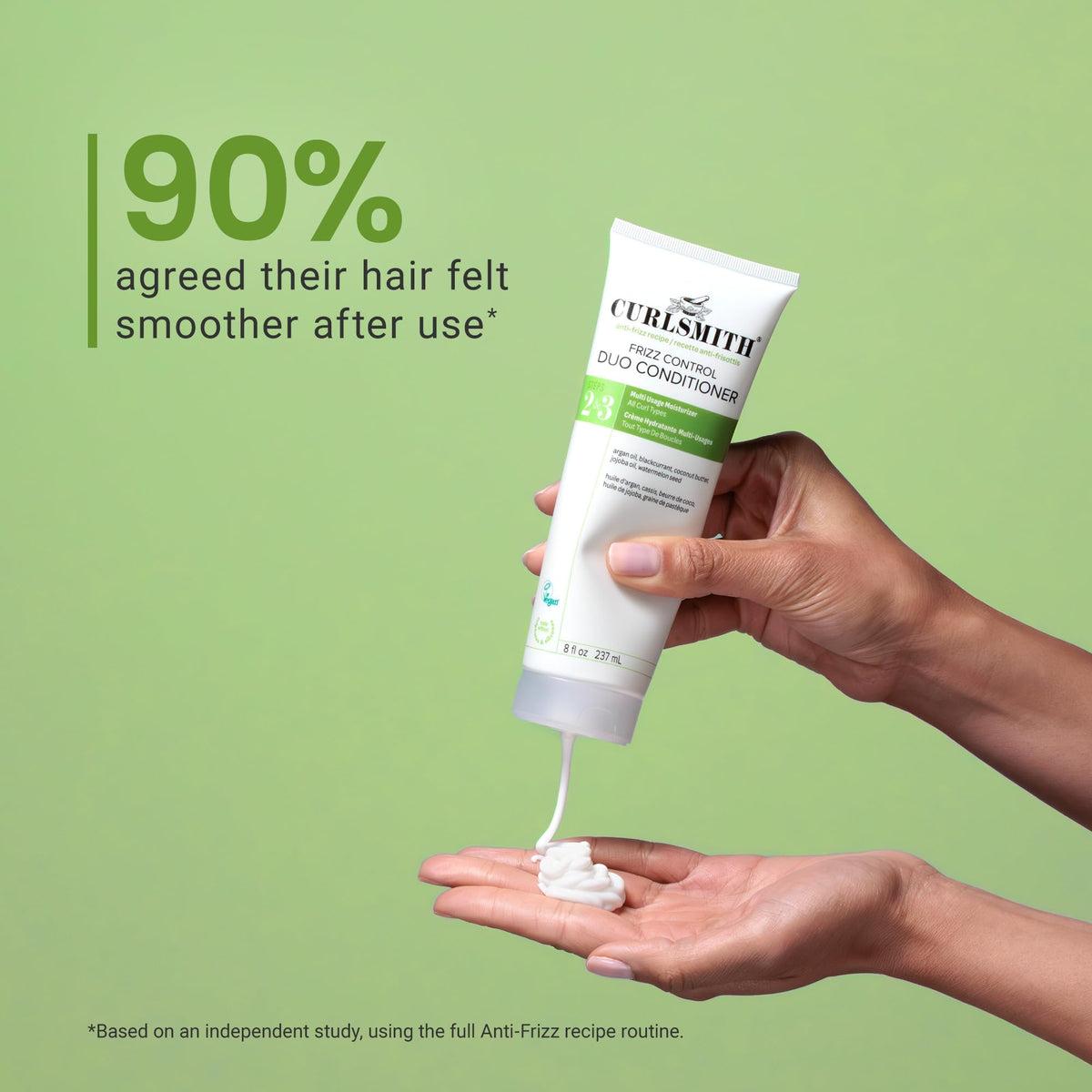 CURLSMITH applying conditioner to wet hair demonstrating easier detangling