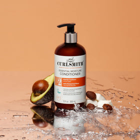 CURLSMITH conditioner with matching shampoo to illustrate system use benefits