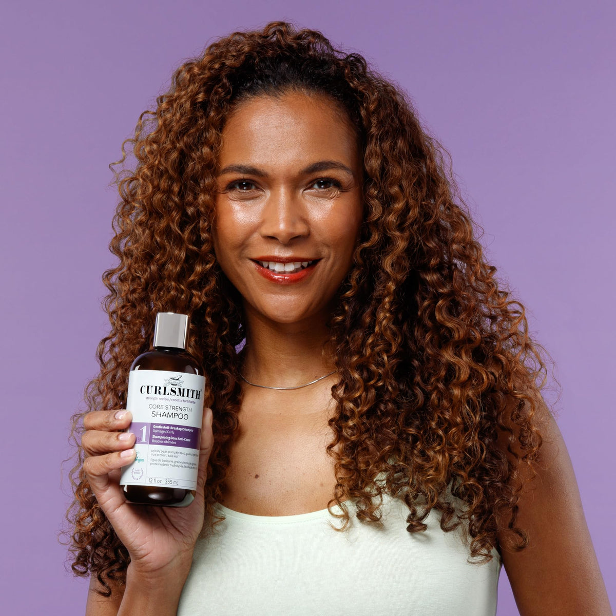 CURLSMITH in-shower use on curly hair demonstrating gentle cleanse