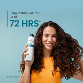 CURLSMITH applying mousse to damp hair, helps create lift at roots