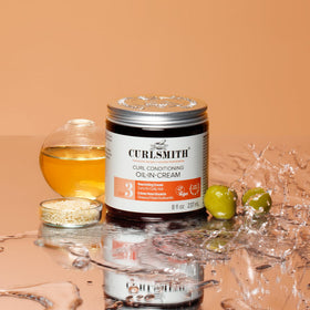 CURLSMITH label close-up shows ingredient and vegan cruelty-free claims