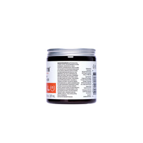 Curlsmith jar on bathroom shelf as part of a curl-care routine