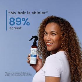 CURLSMITH bottle styled on a bathroom shelf suggesting everyday use