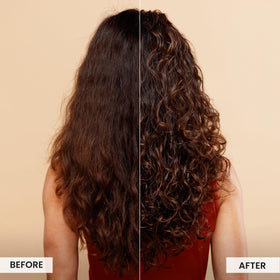 CURLSMITH spraying Miracle Shield on curly hair for heat protection