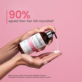 CURLSMITH dispensing conditioner from bottle to show easy application