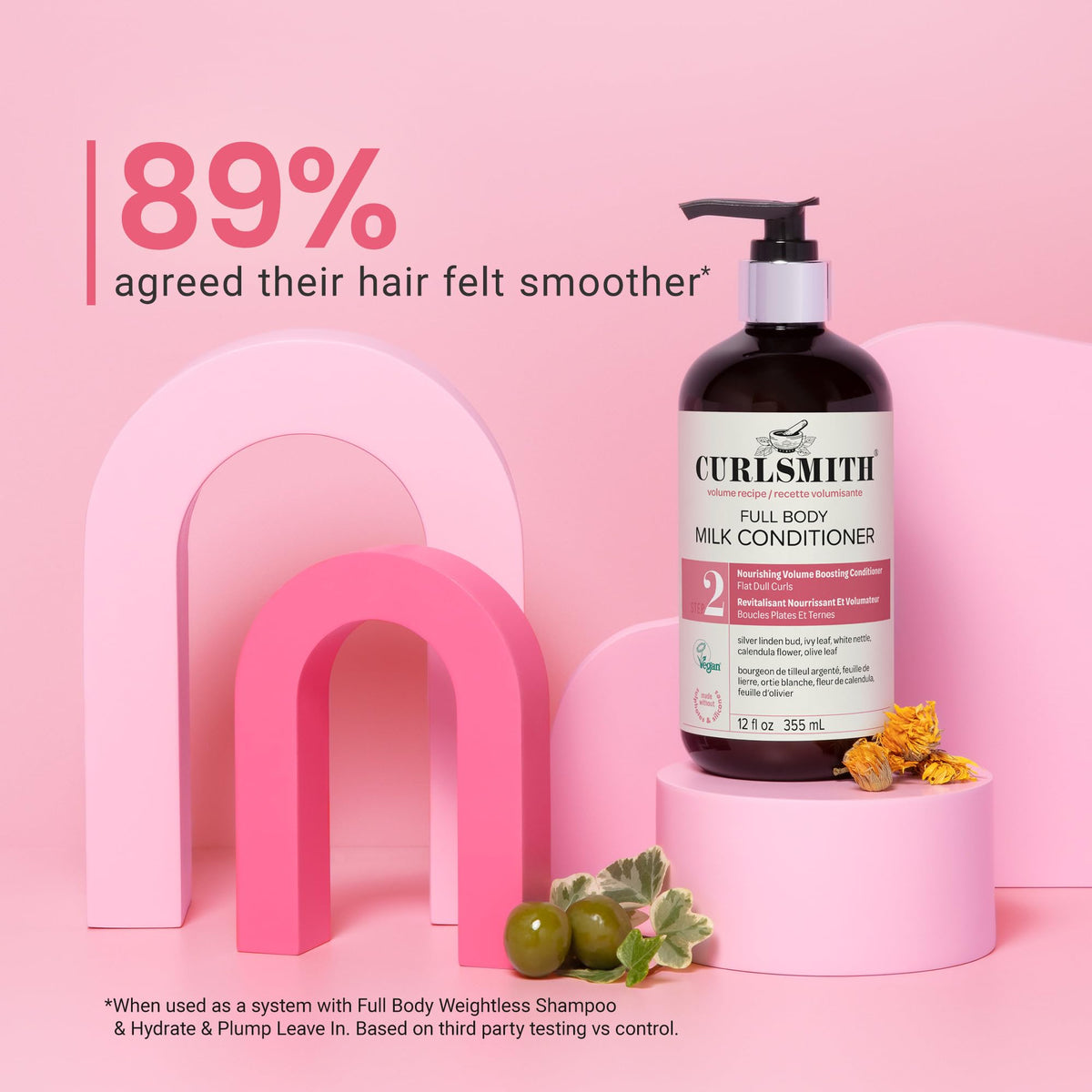 CURLSMITH applying conditioner in shower for smoother, detangled hair