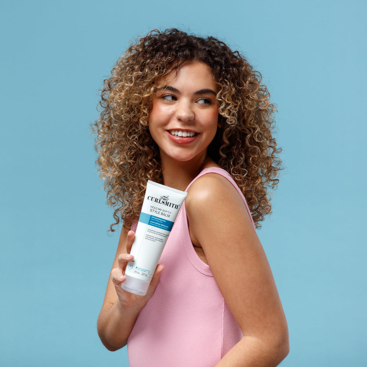 CURLSMITH 8 oz jar in hand showing true size for travel planning