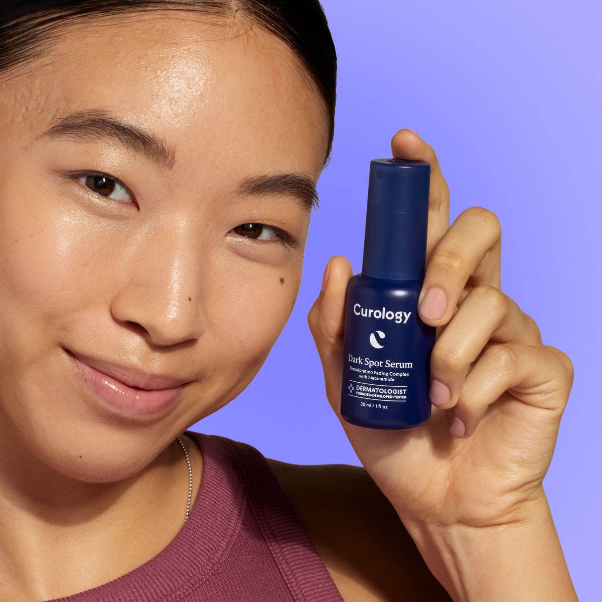Curology dropper releasing serum texture, shows fast-absorbing consistency