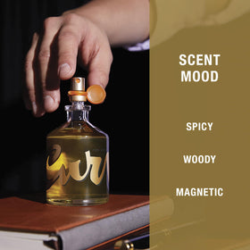 Close-up of amber and wood texture representing Curve's warm base notes and depth