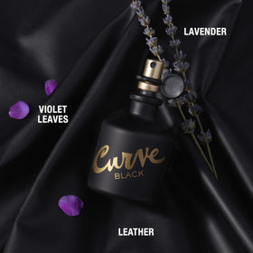 Close-up of Curve Black glass bottle highlighting texture and finish