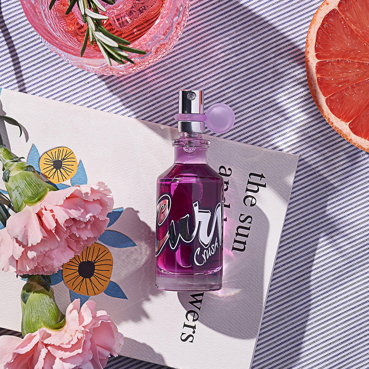 Flatlay of vanilla and white orchid notes showing cozy aromatic blend
