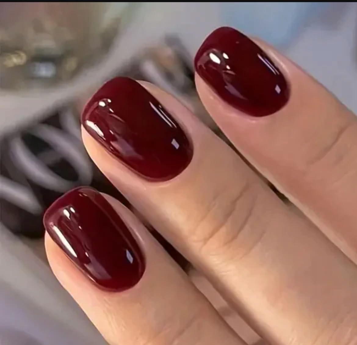 CurvLife close-up of wine red gel pattern highlighting glossy handmade finish