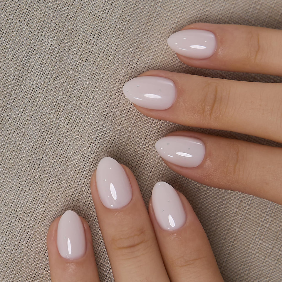 CurvLife front packaging showing milky white extra-short oval nails and 32-piece kit benefit quick salon look