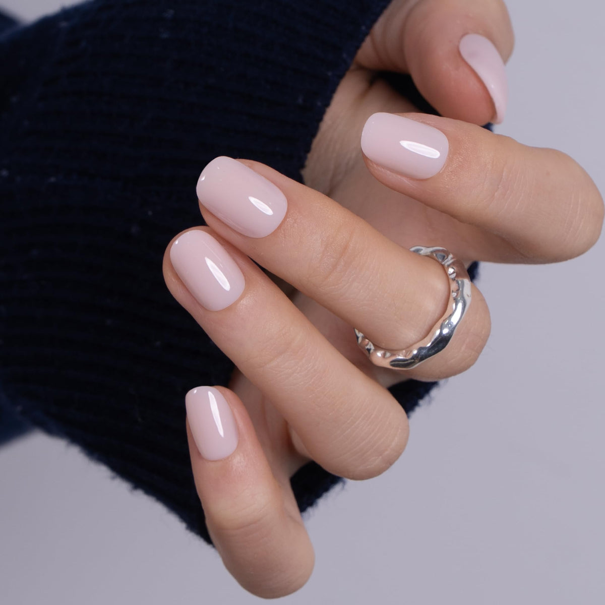 CurvLife in-hand size comparison showing fit and realistic scale on fingers