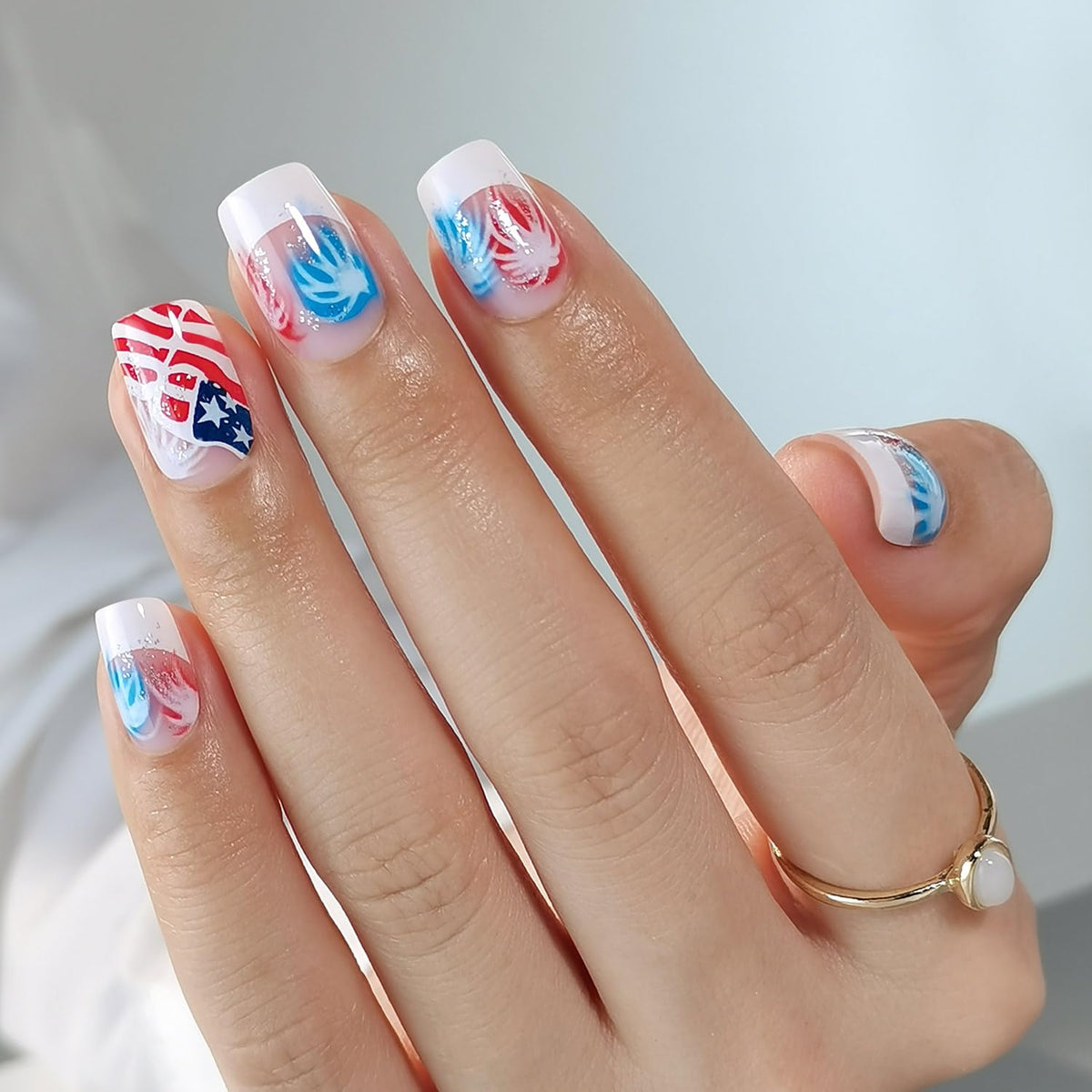 Woman typing on laptop wearing Curvlife nails illustrating comfortable use during daily tasks