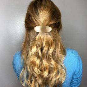CustomyLife side profile of clip in hair demonstrating secure hold and low profile