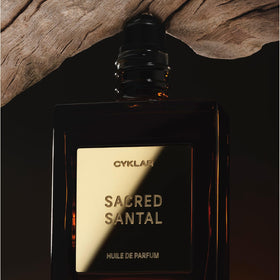 CYKLAR Sacred Santal worn in evening scene conveying warm sophisticated mood