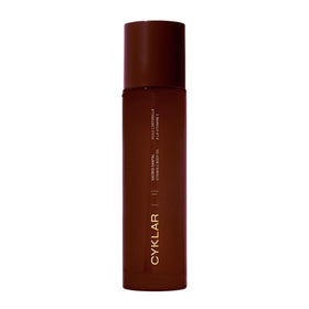 CYKLAR bottle front view showing Sacred Santal label and elegant packaging