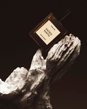 CYKLAR Sacred Santal oil texture drop illustrating creamy sandalwood emollience