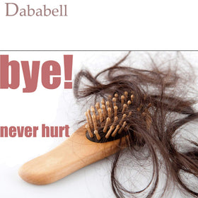 Dababell finished loose waves after using rollers showing soft natural curl