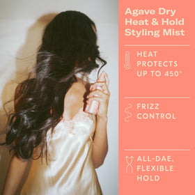 DAE mist on hair strand showing lightweight texture and added shine