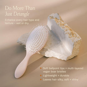 DAE close-up of bristles highlighting vegan boar-like fibers and detanglers for gentle care