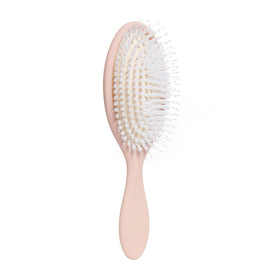 DAE brush front view showing ergonomic shape and sleek finish for easy styling