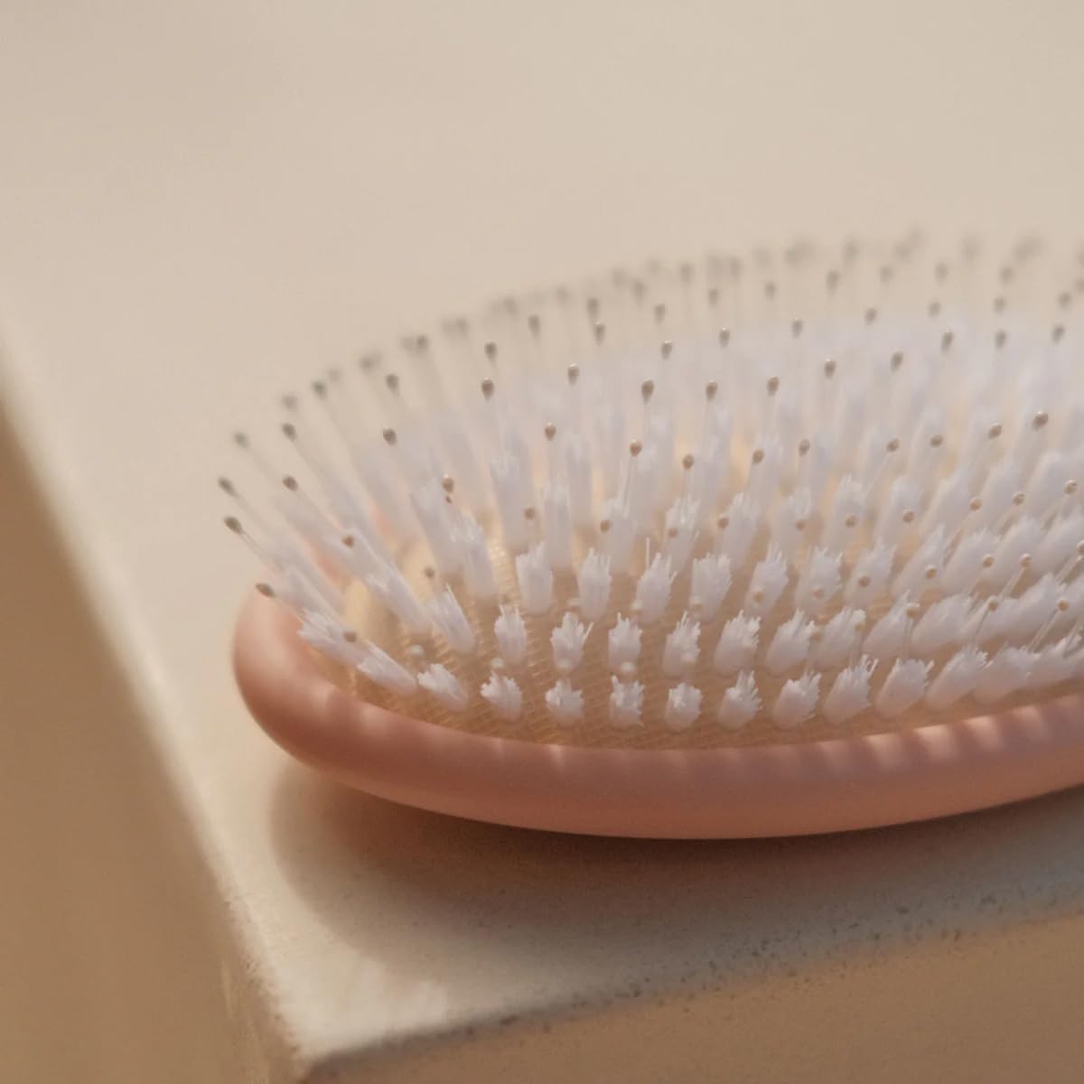 DAE brush smoothing hair texture after use for shinier, less frizzy finish
