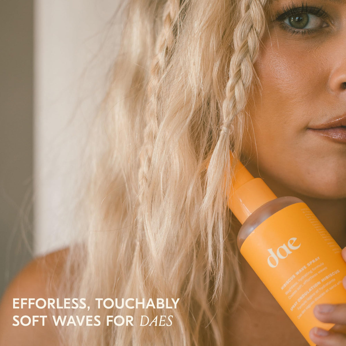Hair strand detail after spray showing soft texture and added volume benefit