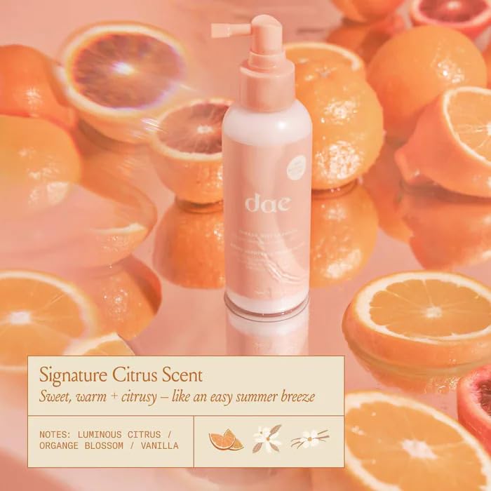 DAE Mirage Mist being sprayed on damp hair for detangling and heat prep benefit