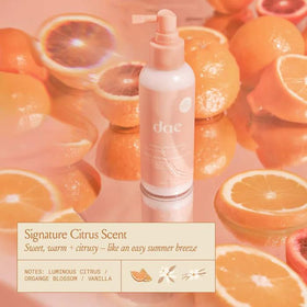 DAE Mirage Mist being sprayed on damp hair for detangling and heat prep benefit