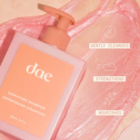 DAE shampoo lather close-up on hand, shows gentle cleansing action
